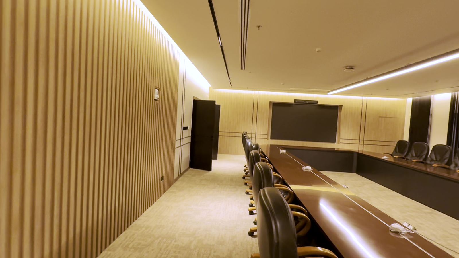 Wood-slat feature wall and boardroom