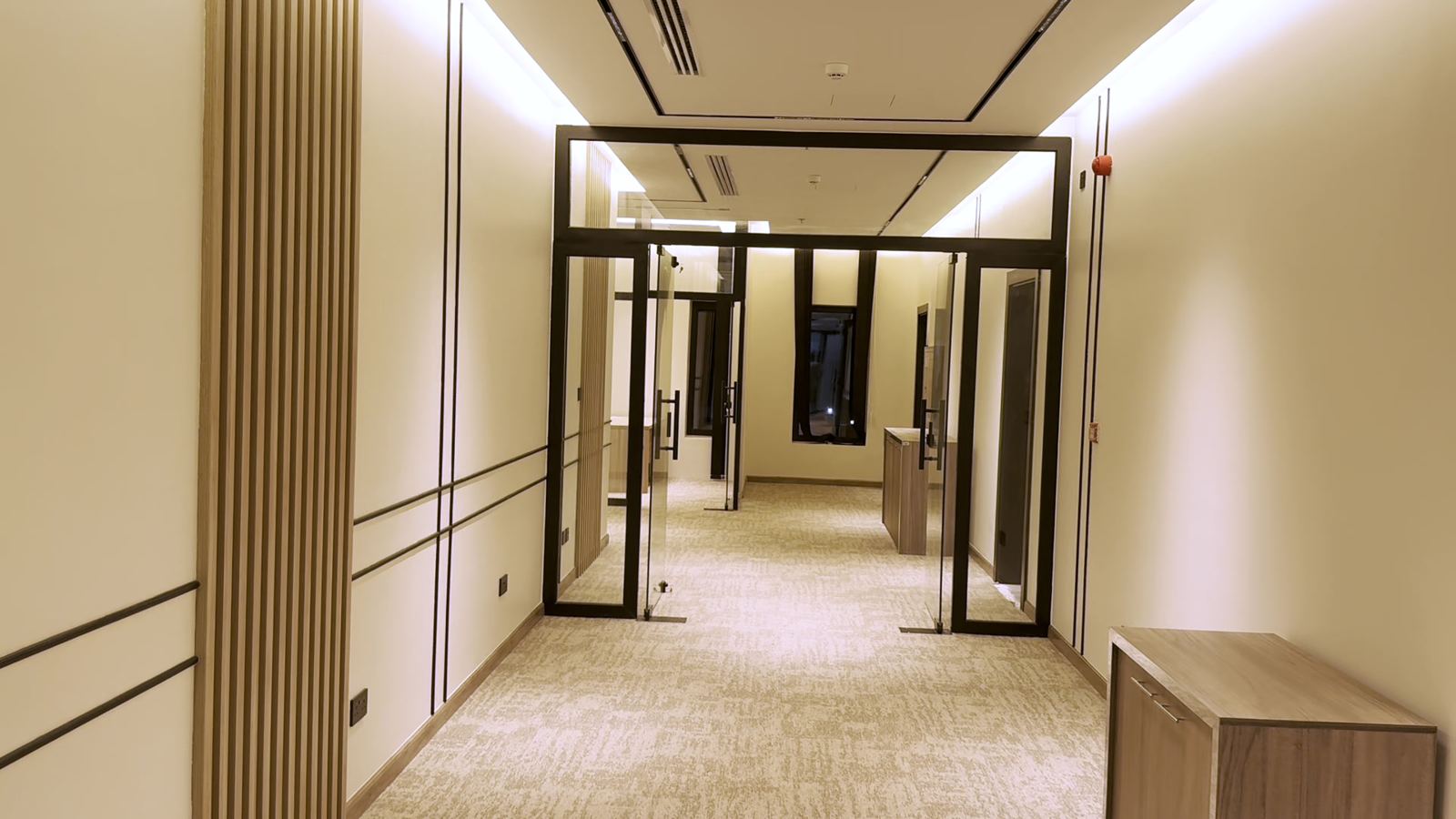 Main corridor with glass partitions