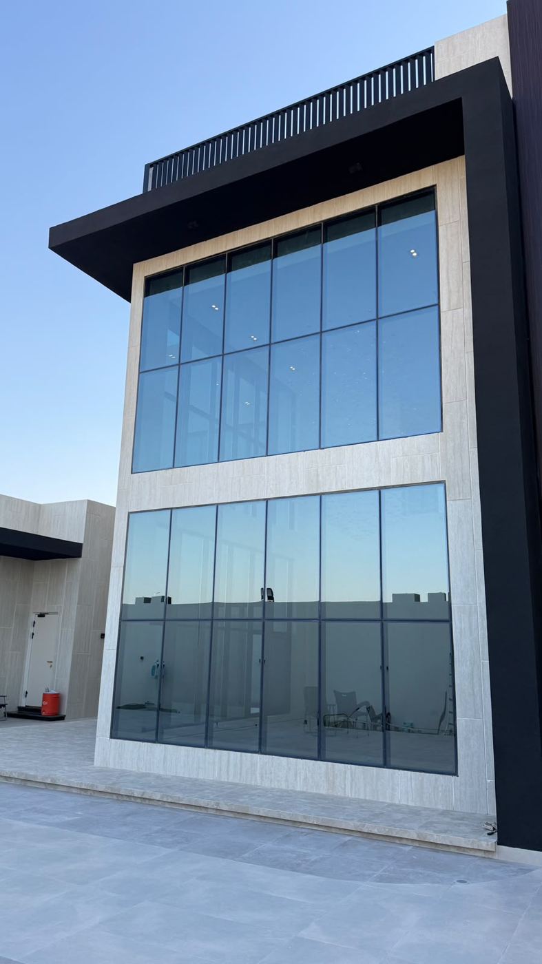 Double-height glazed facade