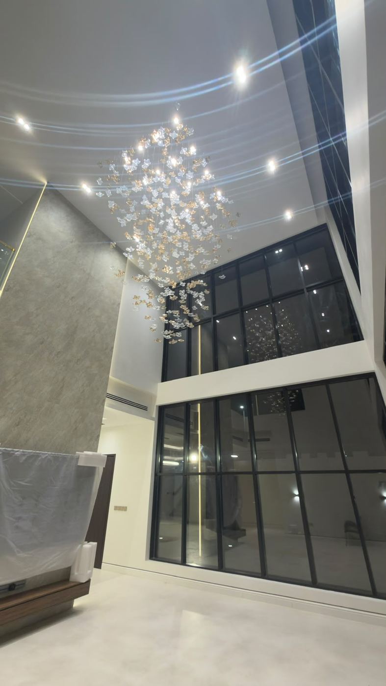 Double-height hall with chandelier
